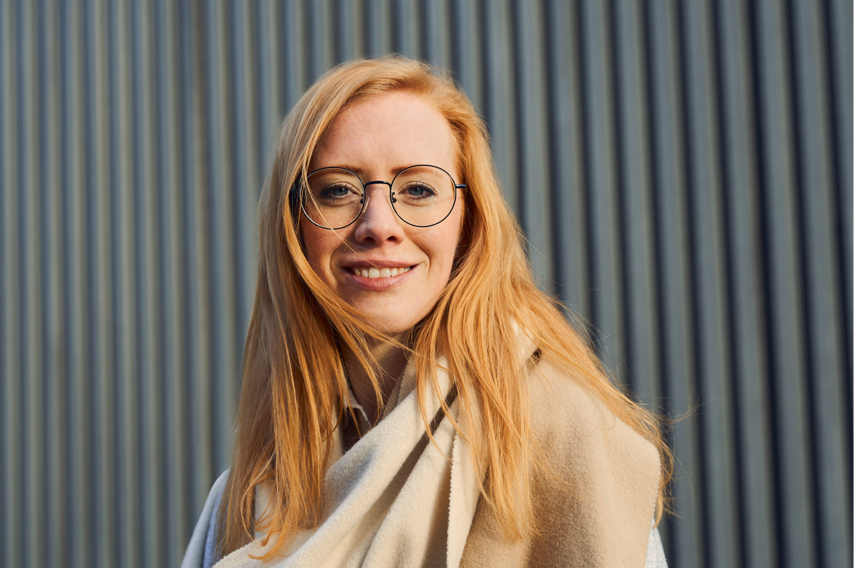 Portrait of Franziska smiling at the camera